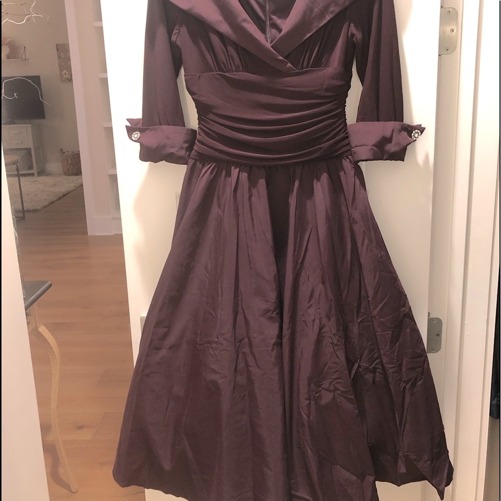 Elegant, plum colored taffeta party dress.